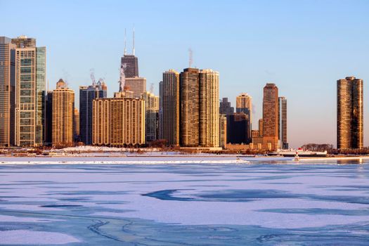 Winter in Chicago - skyline at sunrise. Chicago, Illinois, USA.