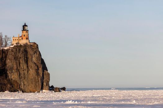 Split Rock Lighthouse and frozen Lake Superior. Minnestota, United States.