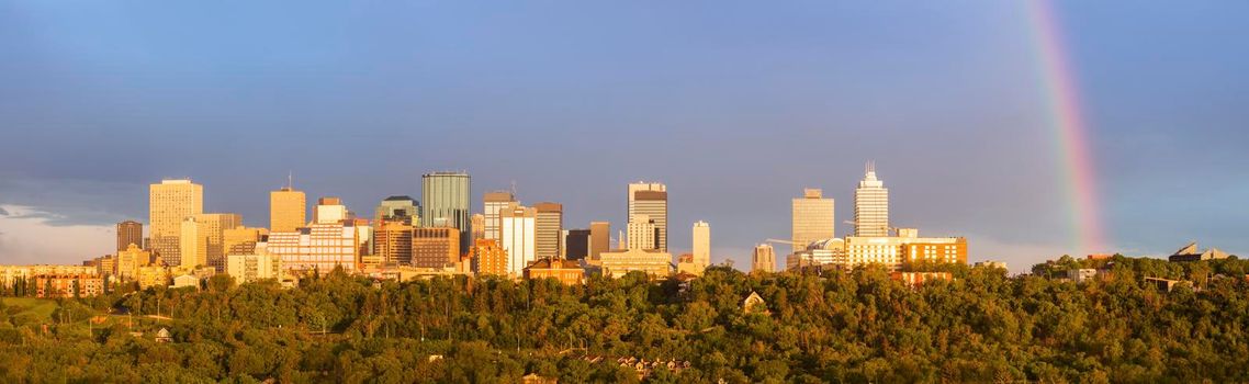 Rainbow over Edmonton - panoramic view of the city. Edmonton, Alberta, Canada.