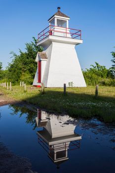 Borden Wharf Lighthouse in the Bay of Fundy. Nova Scotia, Canada.