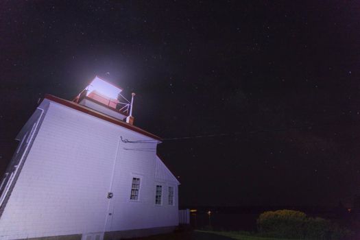 Gilbert Point Lighthouse at night. Nova Scotia, Canada.