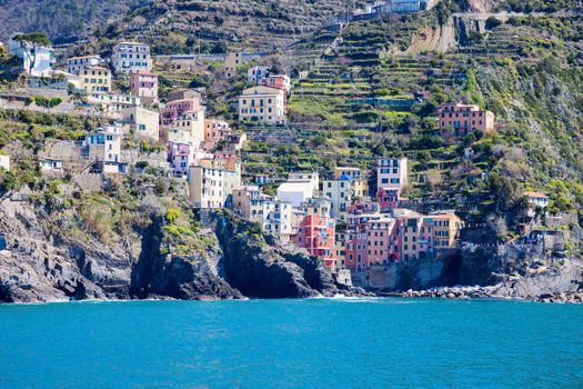Riomaggiore architecture from the sea. Riomaggiore, Liguria, Italy.