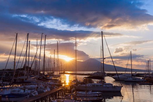 Sun rising above Vesuvius in Naples. Naples, Campania, Italy.