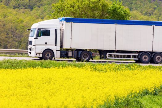 Semi truck driving in Tuscany. Tuscany, Italy. 