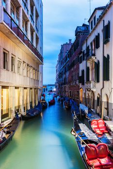 Gondolas in Venice at sunrise. Venice, Veneto, Italy.