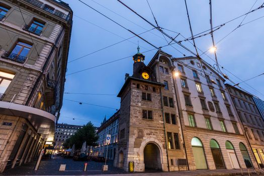 Molard Tower in Geneva seen at night. Geneva, Switzerland.