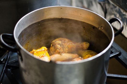 Fried chicken stew. Skillet Fried chicken with vegetable. Crispy fried chicken meat. Top view. slow-cooker chicken meat.