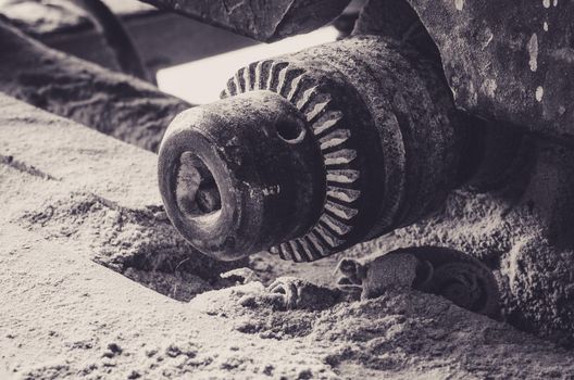 Close-up of gears of an old wood cutting machine. Industrial theme