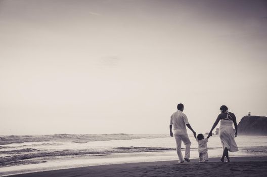Happy family enjoying sunset in the summer leisure in Lima - Peru