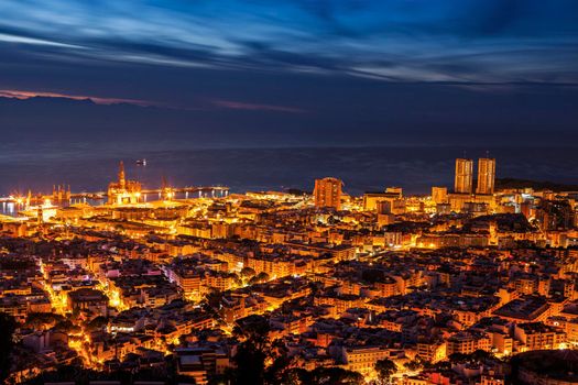 Panorama of Santa Cruz de Tenerife. Gran Canaria silhouette in the background. Santa Cruz de Tenerife, Tenerife, Spain.