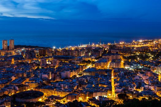 Panorama of Santa Cruz de Tenerife. Gran Canaria silhouette in the background. Santa Cruz de Tenerife, Tenerife, Spain.