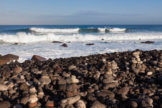Stone piles on the beach in Puerto de la Cruz. Tenerife, Canary Islands, Spain.