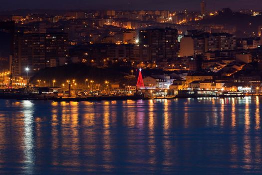 Panorama of Almada from Lisbon at night. Almada, Lisbon, Portugal.
