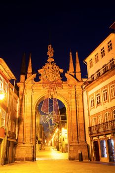 Porta Nova arch in Braga at dawn. Braga, Norte Region, Portugal.