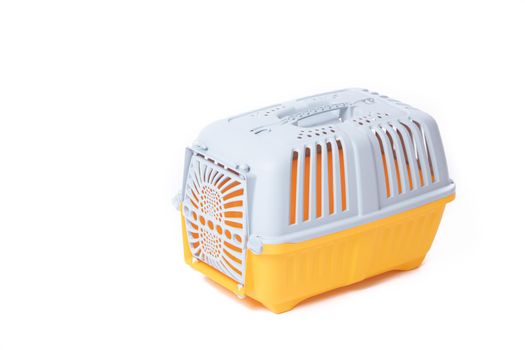 Carrier for cats and small dogs isolated on a white background. safe transportation of animals, article about the transportation of animals. Isolated white background. Gray plastic carry for cats. Veterinary Medicine Article about veterinarians