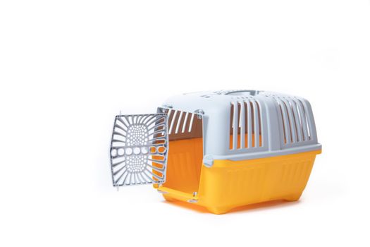 Carrier for cats and small dogs isolated on a white background. safe transportation of animals, article about the transportation of animals. Isolated white background. Gray plastic carry for cats. Veterinary Medicine Article about veterinarians