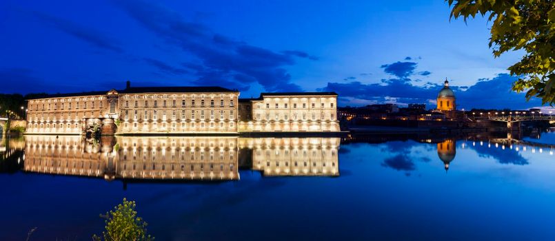 Illuminated waterfront in Toulouse. Toulouse, Occitanie, France.