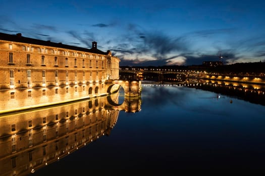 Pont Saint Pierre and Hotel Dieu Saint Jacques - old hospital in Toulouse. Toulouse, Occitanie, France.