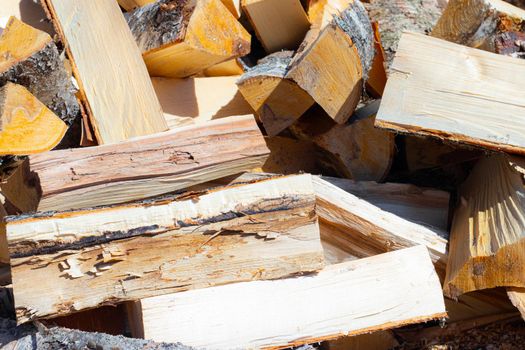 Background of firewood, article about chopping firewood, stove heating, deforestation.