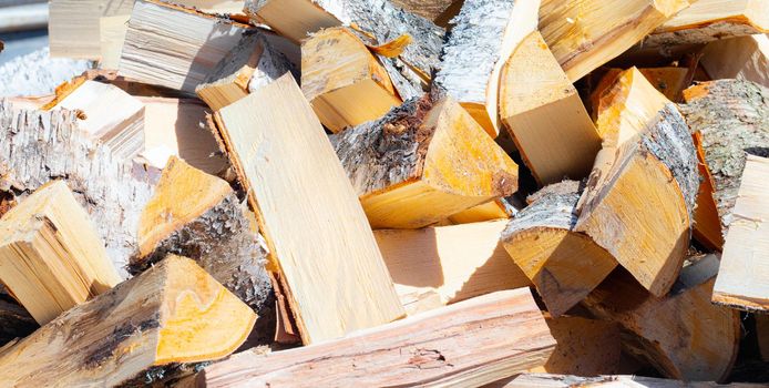 Background of firewood, article about chopping firewood, stove heating, deforestation.