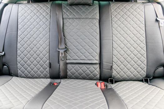 Car covers made of eco leather. An article about the upholstery of seats in a car. Premium cases. Premium car design. Rich finish. Gray eco leather covers. Car