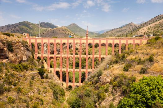 Aguila Aqueduct and blue sky. Nerja, Andalusia, Spain.