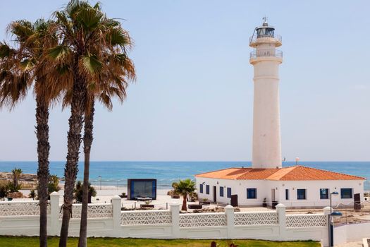 Torrox Lighthouse and blue sky. Torrox, Andalusia, Spain.