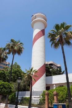 Marbella Lighthouse and blue sky. Marbella, Andalusia, Spain.