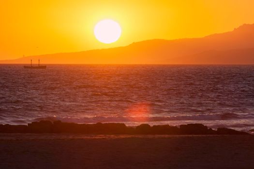 Sunset on the beach in Tarifa. Tarifa, Andalusia, Spain.