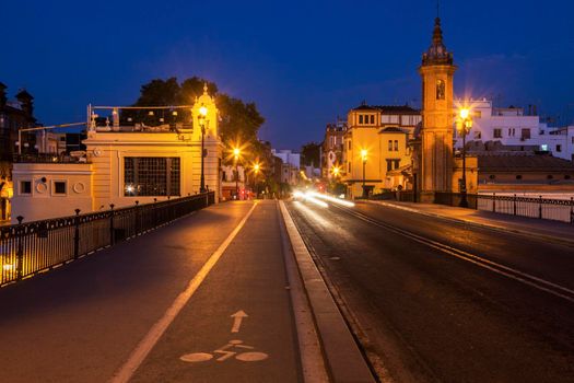 Chapel of Carmen and Isabel II Bridge in Seville. Seville, Andalusia, Spain.