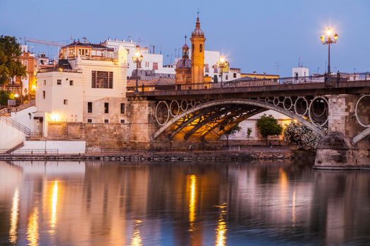 Chapel of Carmen and Isabel II Bridge in Seville. Seville, Andalusia, Spain.