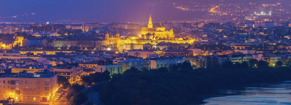 Night panorama of Cordoba with Mosque Cathedral. Cordoba, Andalusia, Spain.