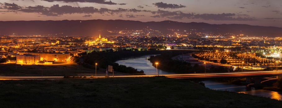 Night panorama of Cordoba with Mosque Cathedral. Cordoba, Andalusia, Spain.