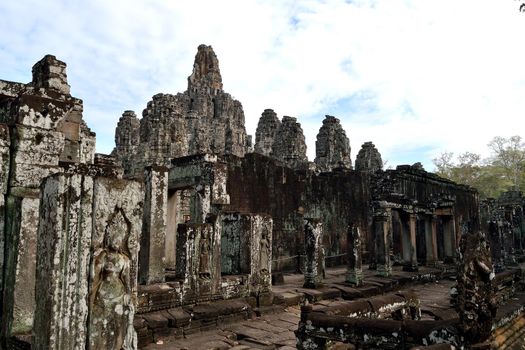 The faces of the Bayon in a cloudy day, Angkor Thom, Cambodia.