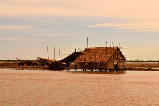 View of a hut on the banks of the huge Tonle sap lake, Cambodia