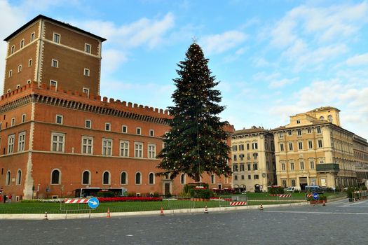 View of the famous Christmas tree in Piazza Venezia with few tourists due to the Covid19 epidemic.