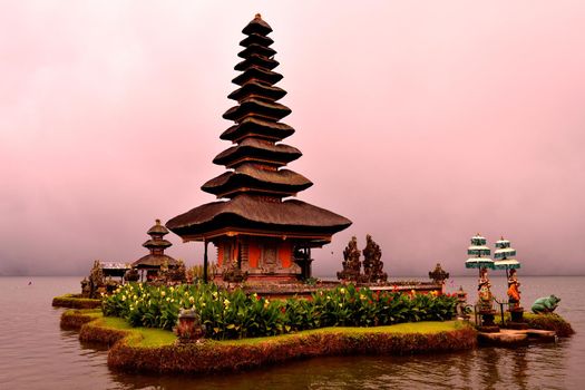 Incredible view of Pura Ulun Danu Bratan temple in a foggy day, Bali