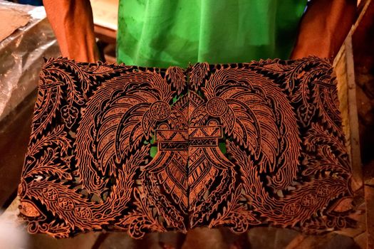 Closeup of some tools used to produce Batik fabric, Indonesia