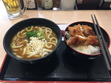 A simple dish of hot udon and tonkatsu in Kyoto, Japan