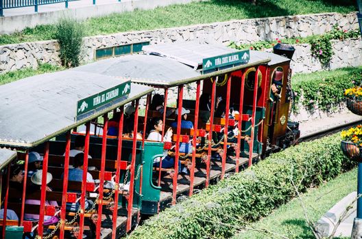 Lima, Peru - November 2, 2018: Families enjoy a ride on train at park of friendship on a summer afternoon in Lima - Peru