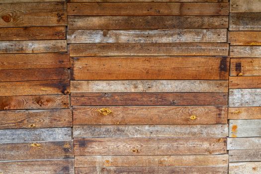 orange uncoated wooden planks wall suface texture and background.