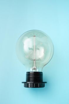 Lamp On Plain Back Ground Presenting New Begining, Bulb On Blue Backdrop Showing New Opinion, One Lightbulb Exhibiting Late Technology Ideas, Light Powersupply.