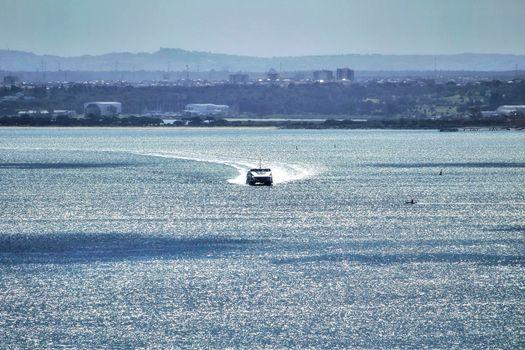 Passenger Ferry crossing the Tagus river in Lisbon on a sunny day
