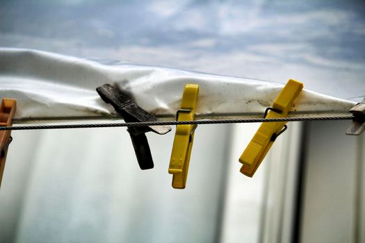 Colored clothespins on a clothesline in Lisbon, Portugal