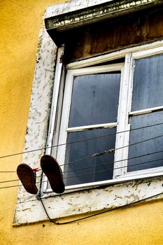 Old colorful and beautiful facades with vintage streetlight in Lisbon streets in Spring.