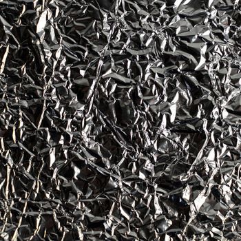 a background made with crumpled aluminum foil