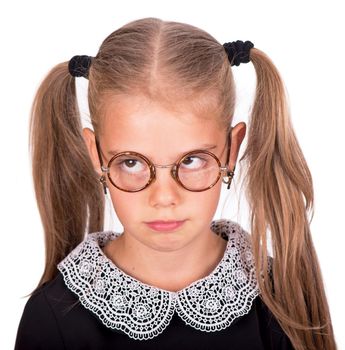 portrait of the youngest schoolgirlisolated on white background.