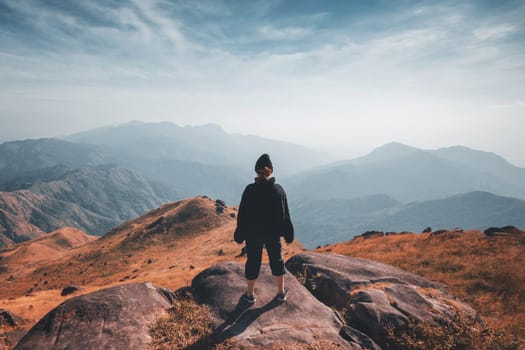 A woman standing on the slopes Beautiful mountain views