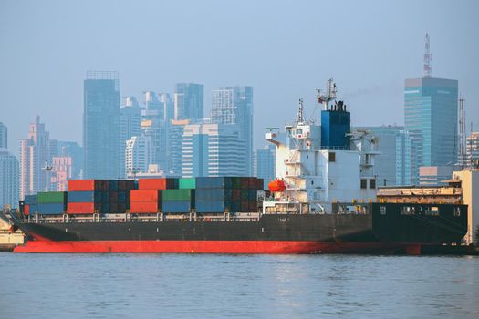 Container ship in export and import business and logistics.
