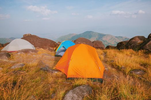 Set up a tent on the hill Full of grasslands
